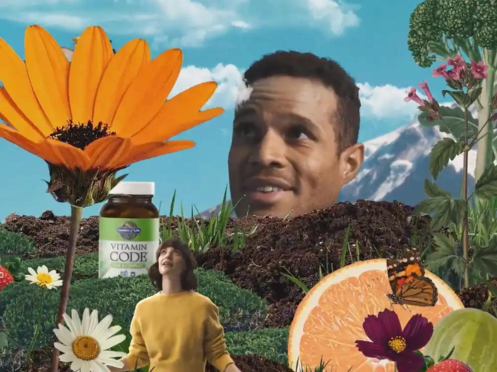 A man's head rises from soil beside Vitamin Code and a woman in yellow, from Garden of Life's Formulas for Feeling Alive
