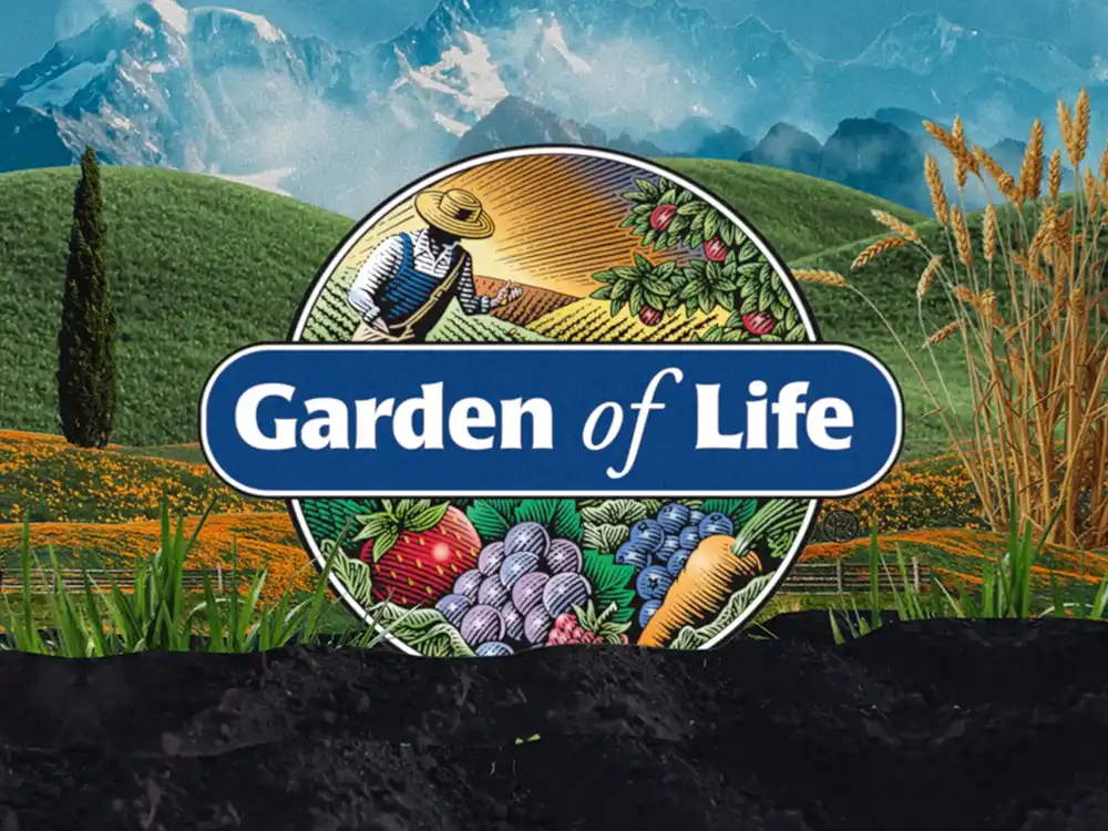 Garden of Life farmer-and-produce logo sits over rolling hills and mountains, from Formulas for Feeling Alive