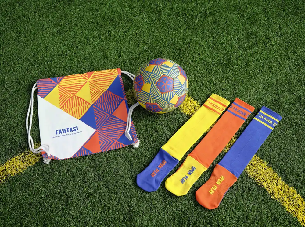 Fa'atasi soccer ball, socks, and bag from the Next Goal Wins capsule collection